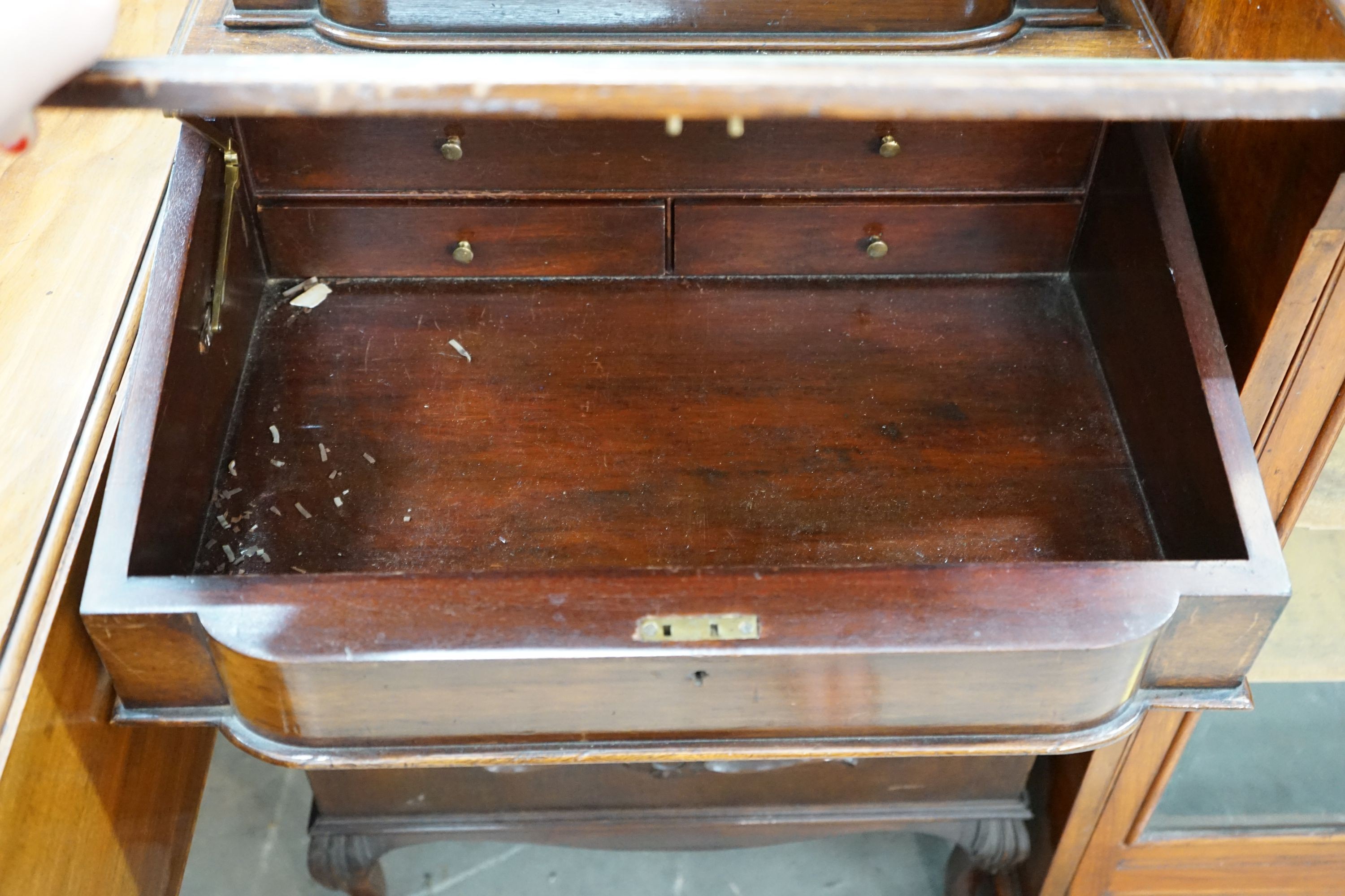 A late Victorian mahogany Davenport, width 56cm, depth 52cm, height 90cm